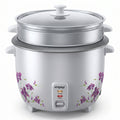 Impex electric rice cooker with a stainless steel body, glass lid, and purple floral pattern on the front, shown on a white background.